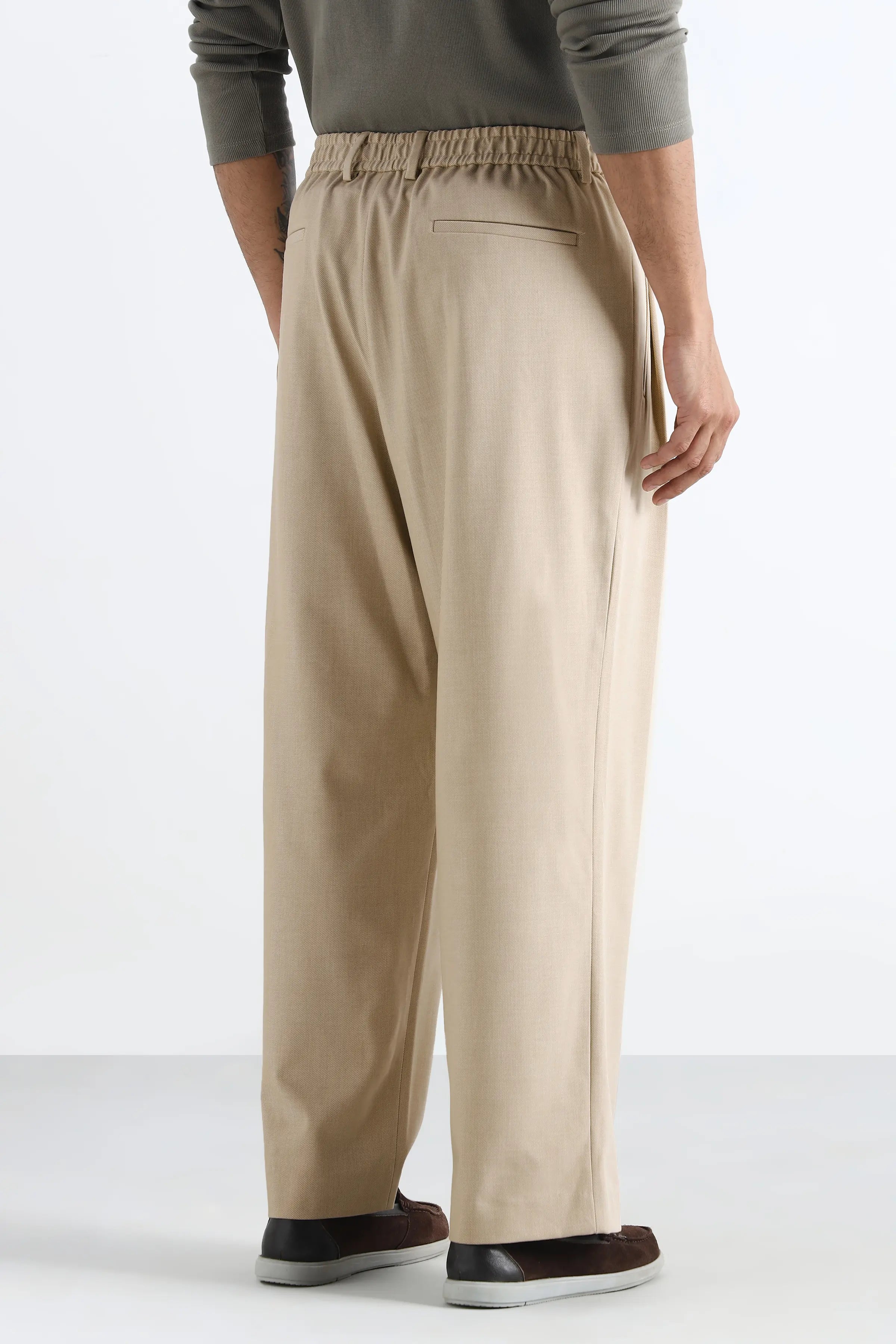 Light Beige Flowing Trousers with Side Pleats