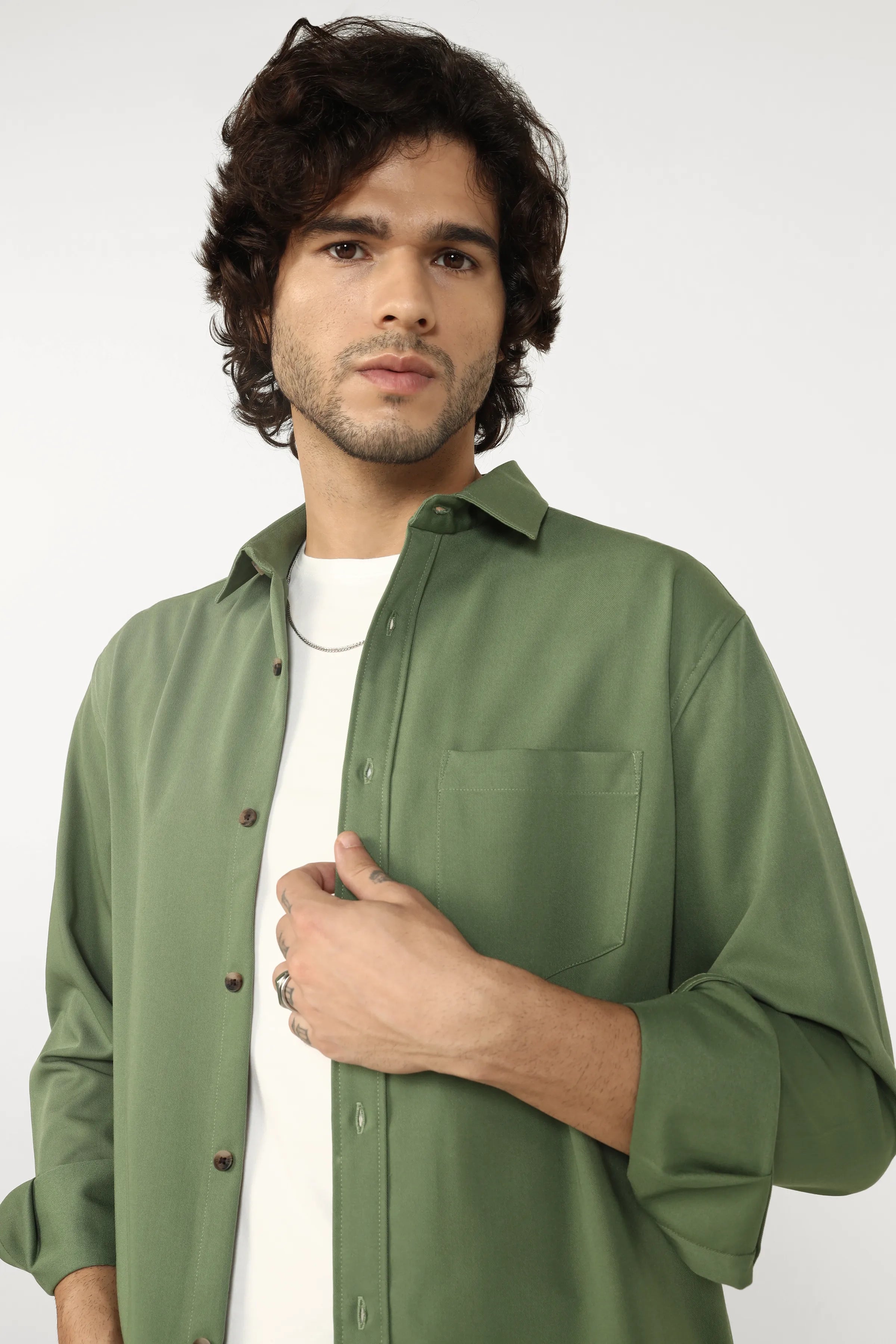 Man wearing a Jade Cotton Twill Shirt shirt against a white background