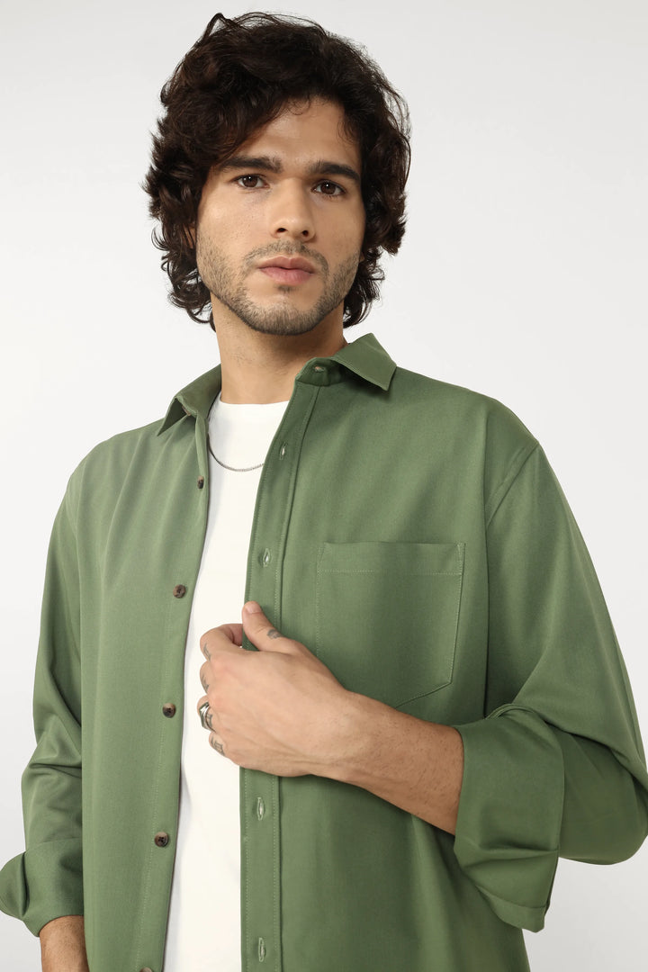 Man wearing a Jade Cotton Twill Shirt shirt against a white background